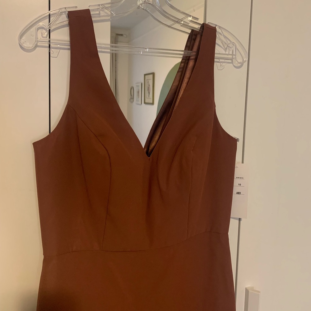 Two identical unworn bridesmaids dresses